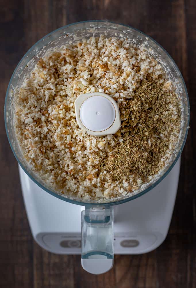 Cauliflower and walnuts ground up in a food processor.