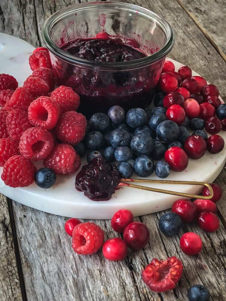 plate of fresh fruit and jam