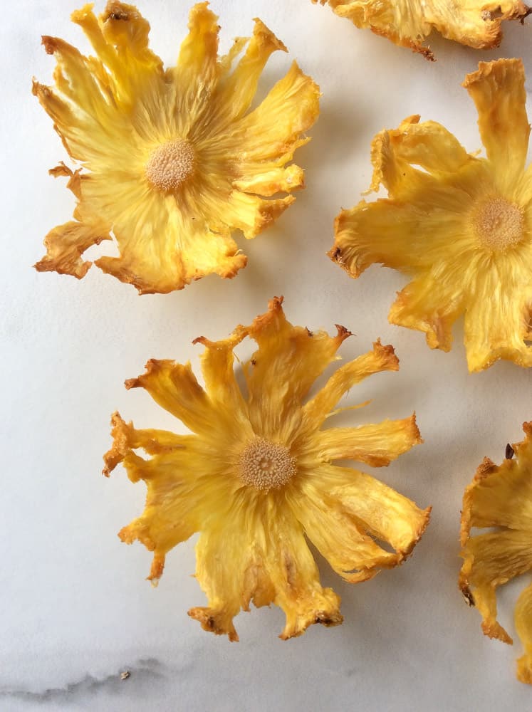 Flowers made out of fresh pineapple slices.