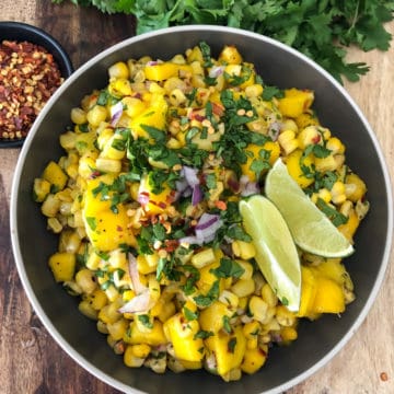 Overhead shot of a big bowl of mango corn salsa.