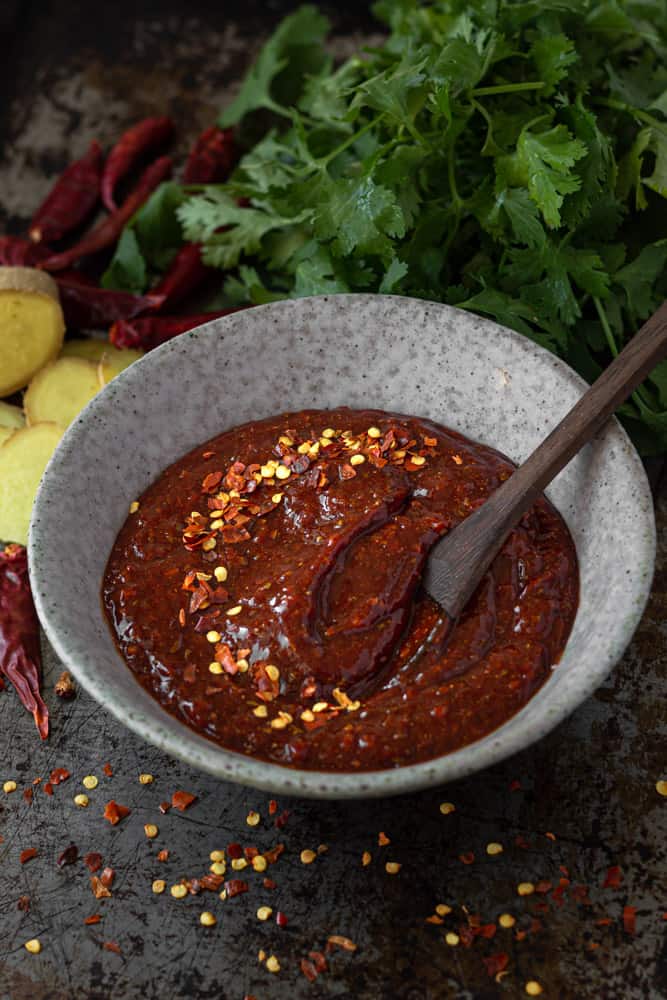 Spicy enchilada sauce in a bowl.