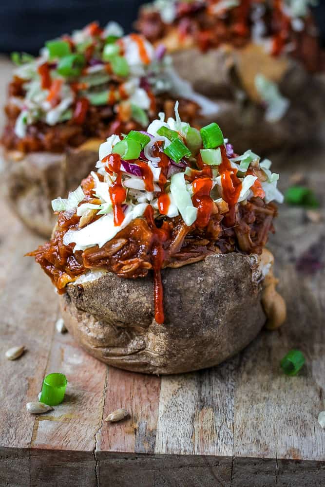 backed potato stuffed with bbq jackfruit and sloppy slaw