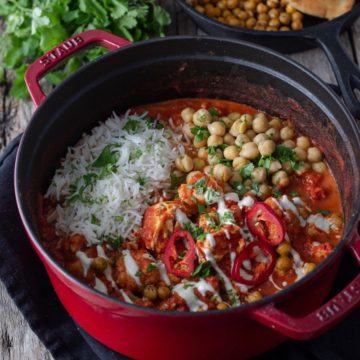 creamy cauliflower curry in a pot with chickpeas and tofu
