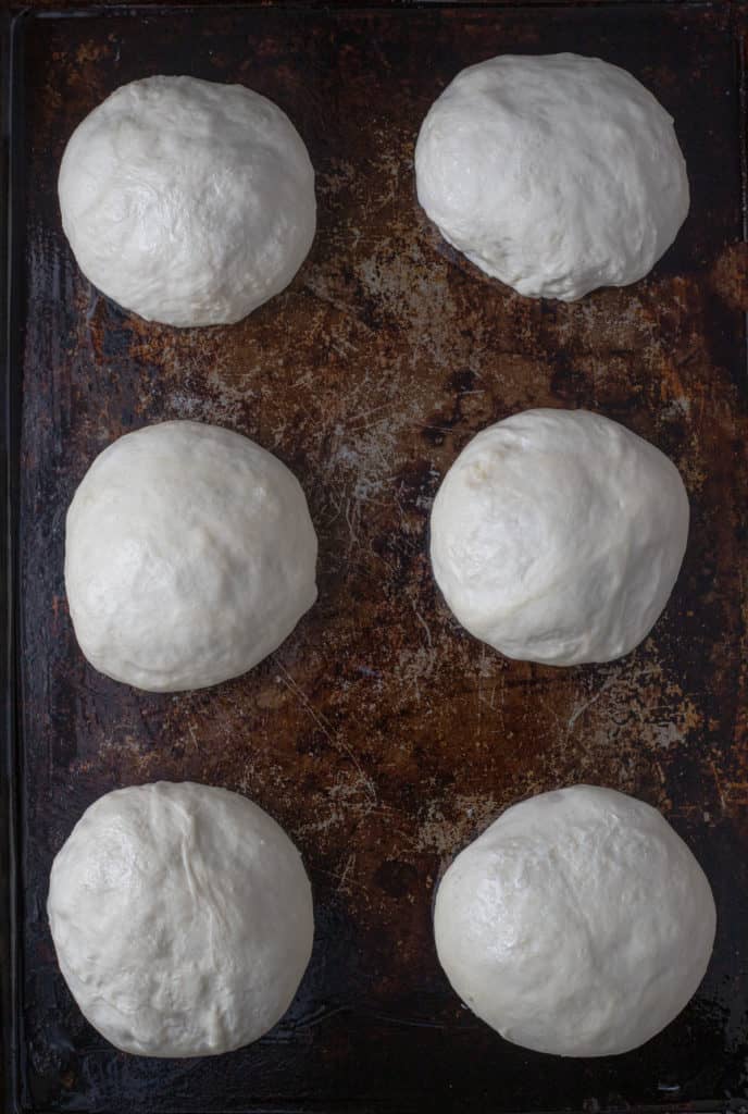 Dinner roll dough on baking sheet.