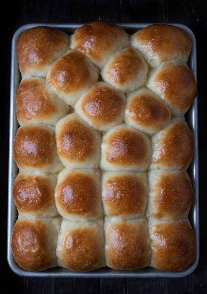 Hot from the oven, tray of dinner rolls.