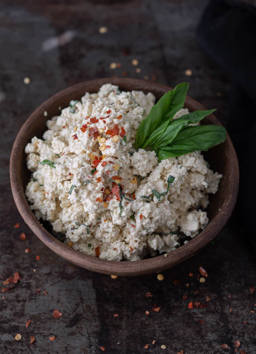 Bowl of vegan tofu-cashew ricotta cheese in a bowl.