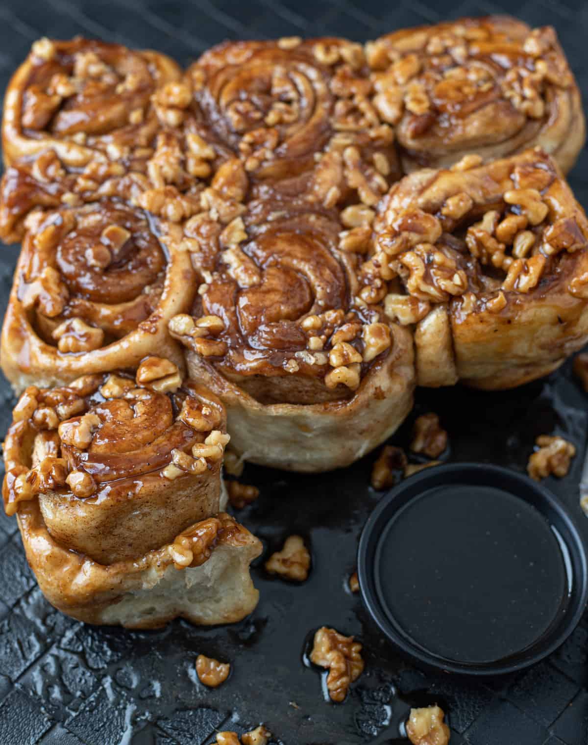 Tray of sticky salted maple nut cinnamon buns.