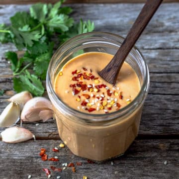 Sweet and spicy tahini sauce in a jar.