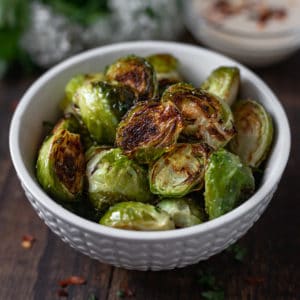 Bowlful of oven roasted Brussels sprouts.