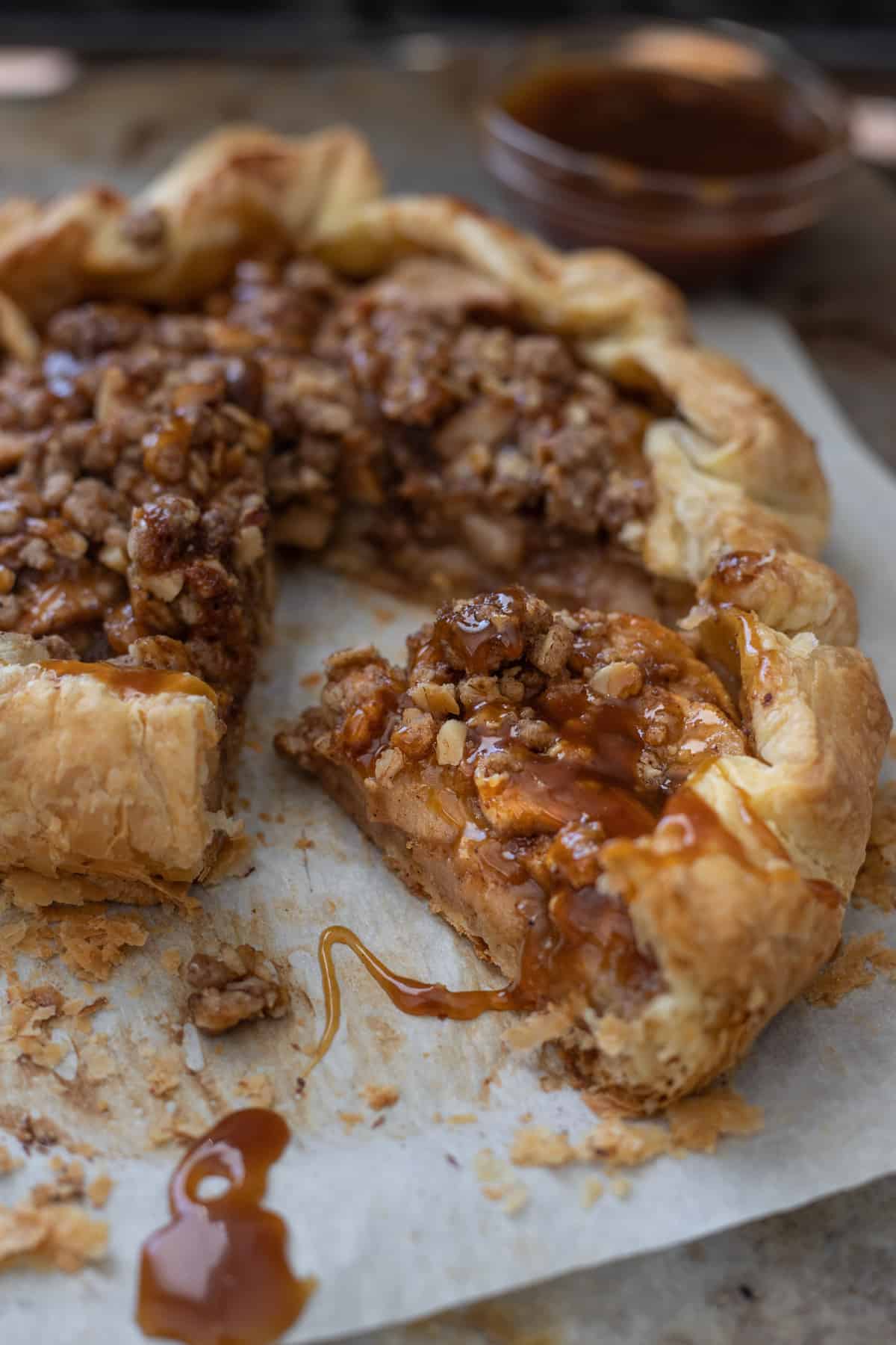 Apple galette with slice taken out.