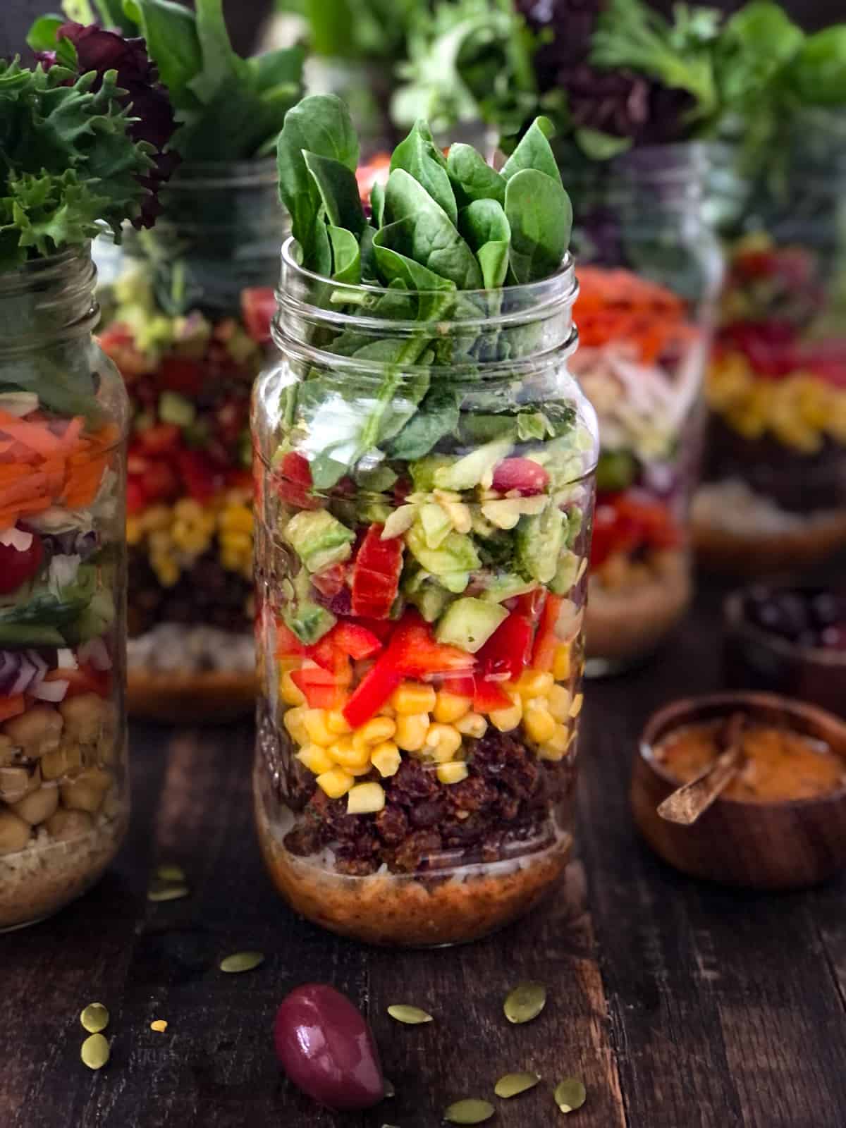 Rice, black beans, and corn in a veggie salad jar.