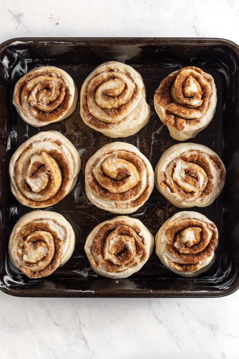 Pan of cinnamon rolls ready for proofing.