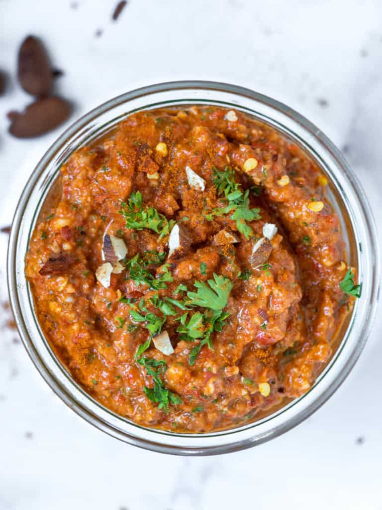 Chunky romesco sauce made with red peppers and tomatoes.