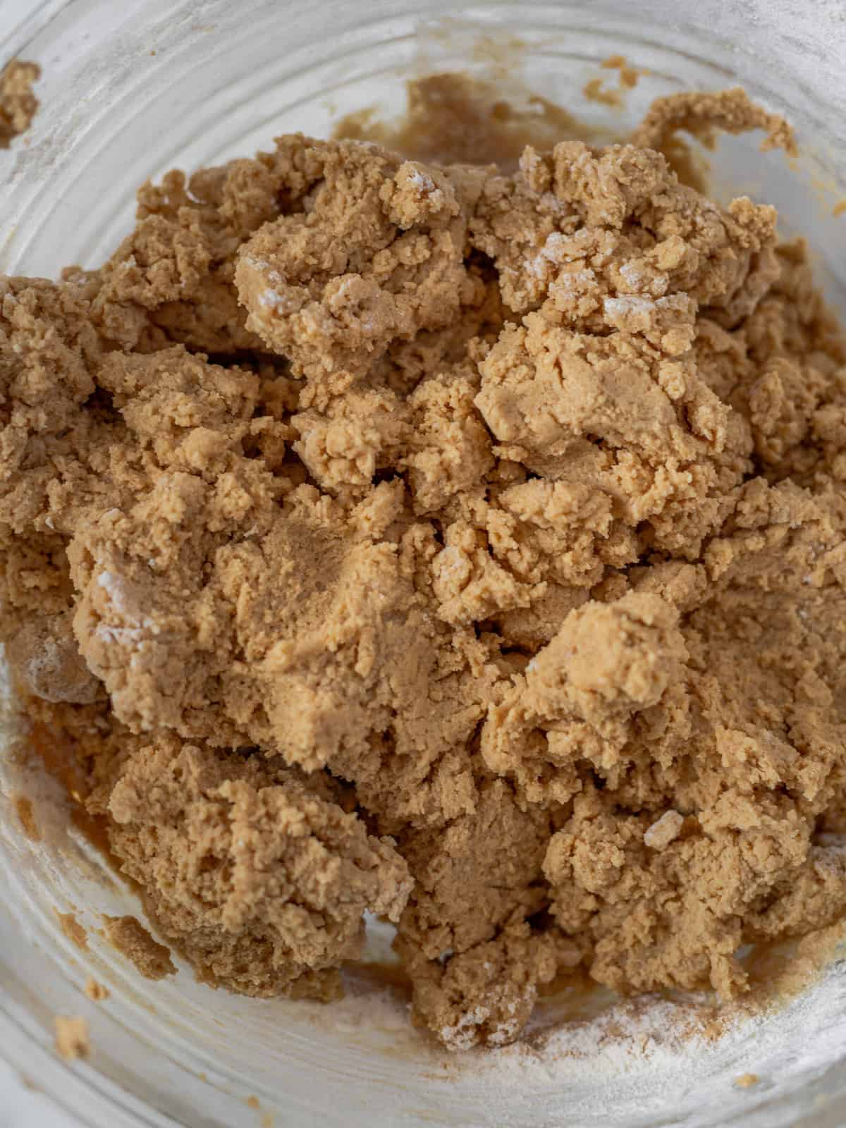 Raw peanut butter cookie dough in mixing bowl.