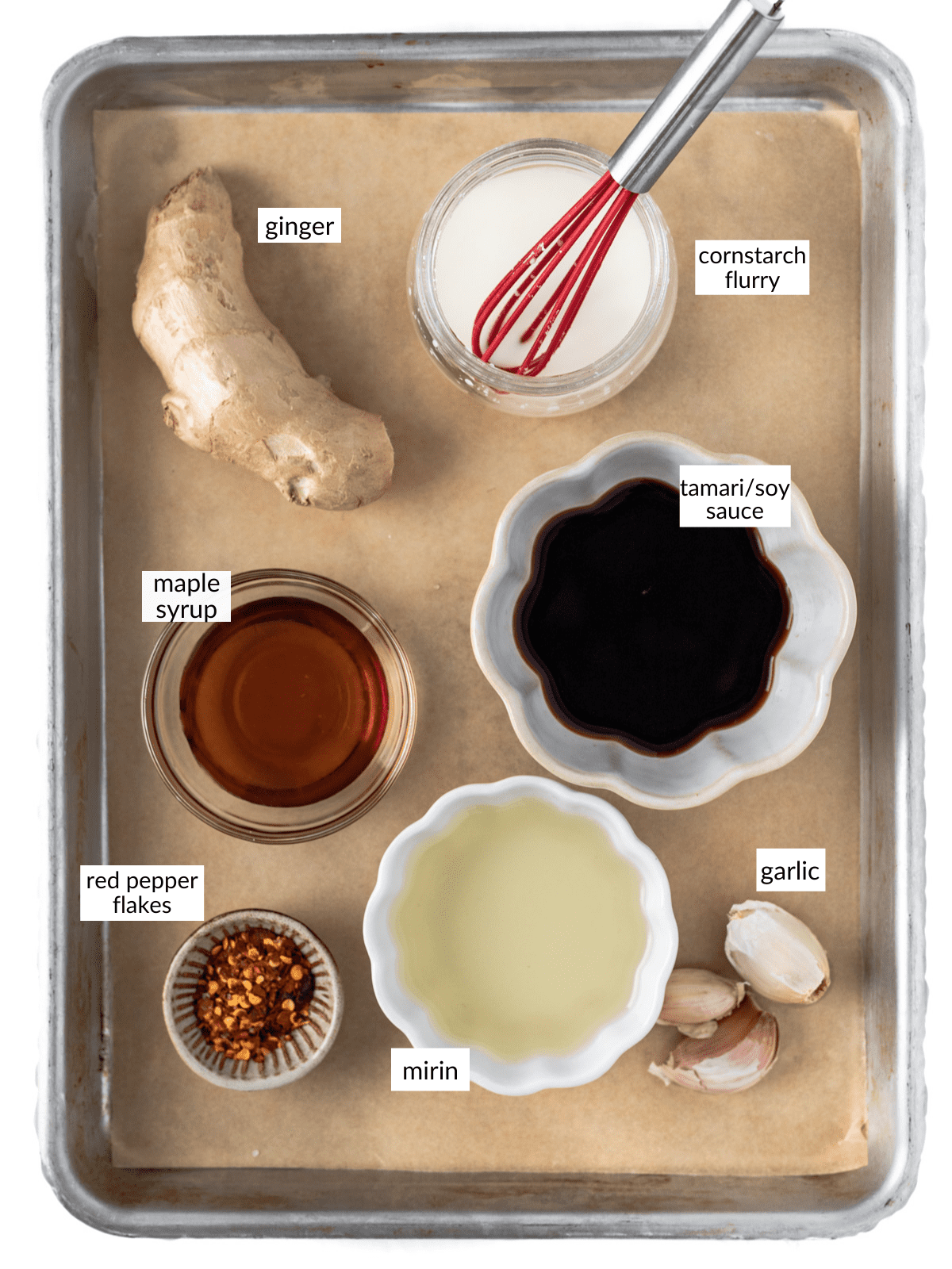 Teriyaki sauce ingredients set out on a sheet pan.