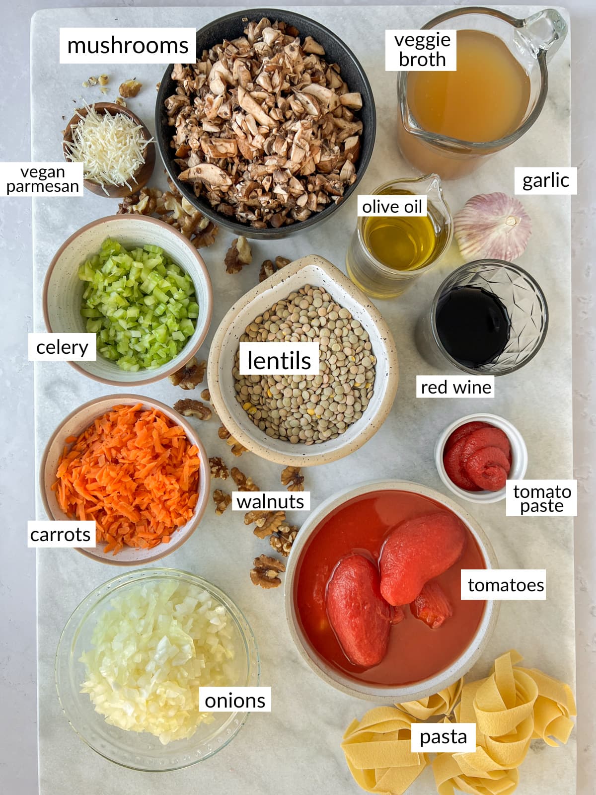 Tray with bowls of ingredients to make lentil bolognese.