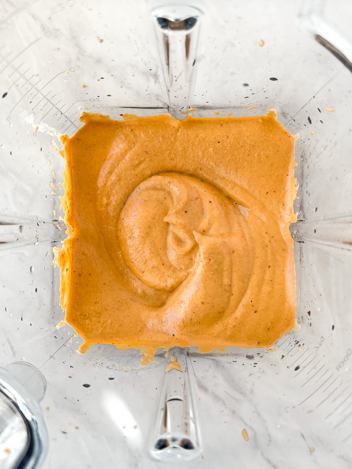 Blended creamy chipotle sauce in a Vitamix blender cup.