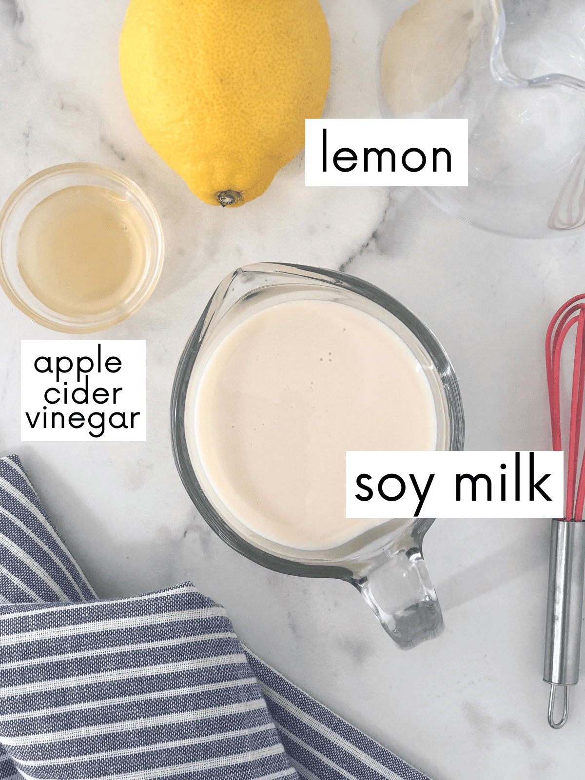 Ingredients for homemade buttermilk measured out in separate dishes.