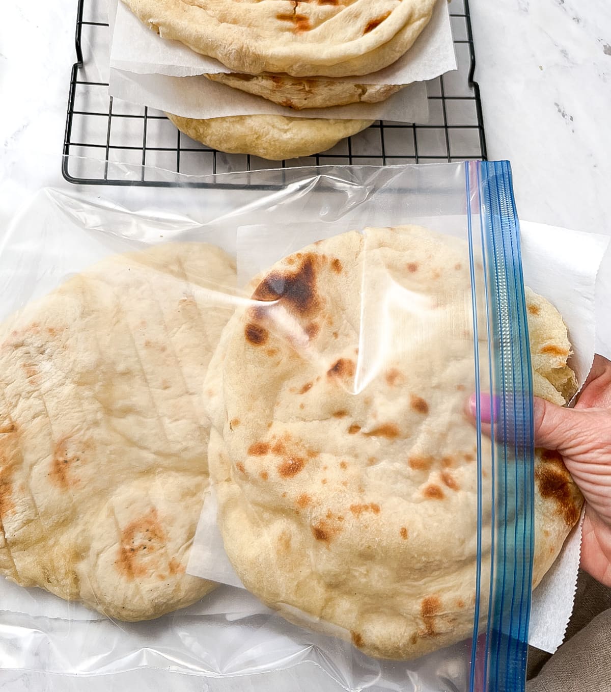 Par-baked pizza crusts in freezer bags.