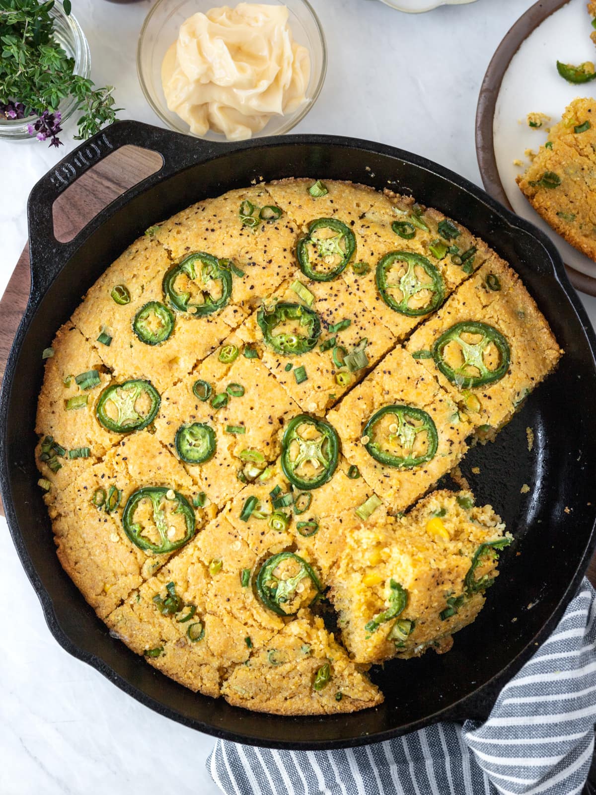 Homemade cornbread in a cast iron skillet.