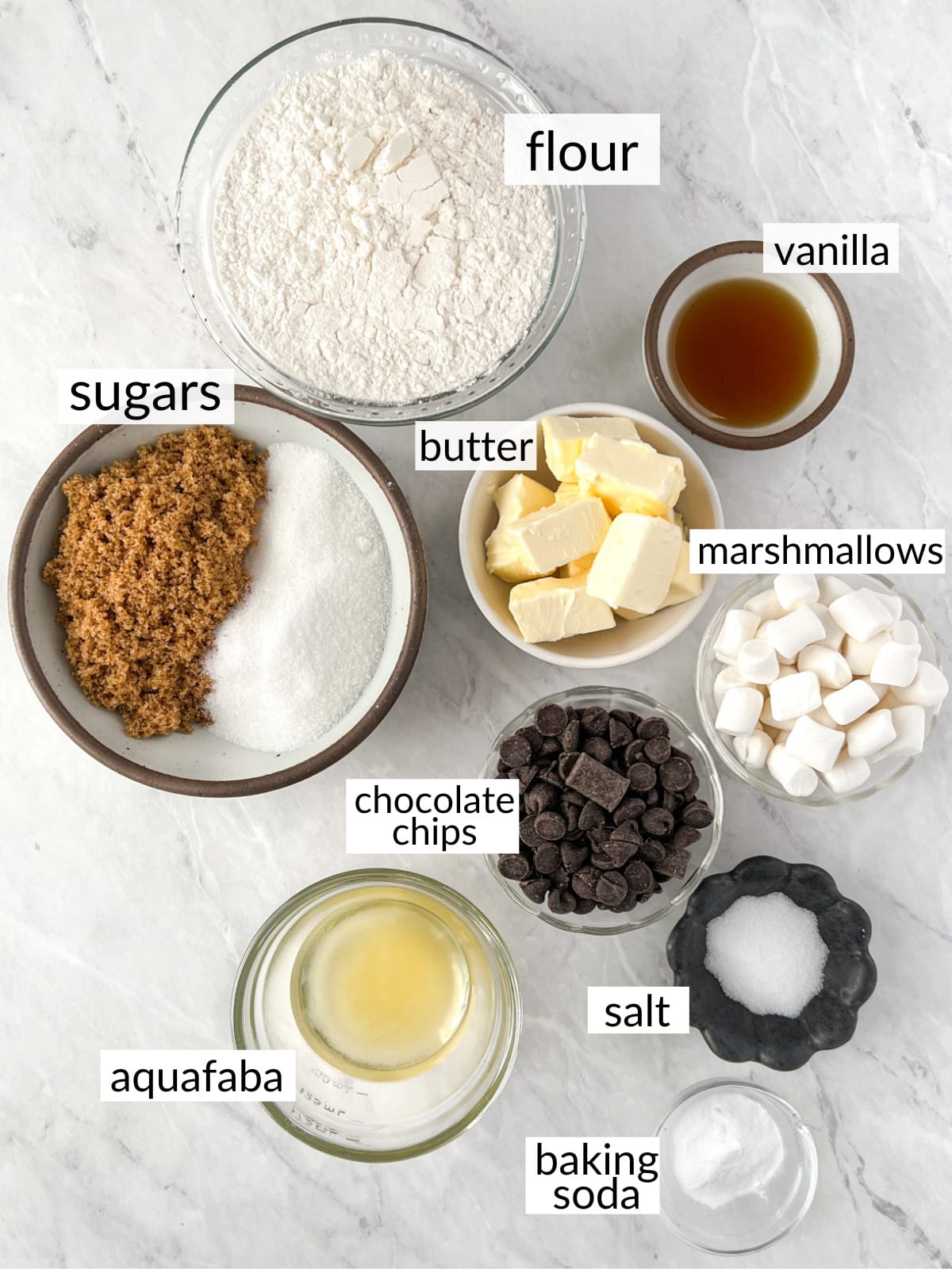 Ingredients to make vegan chocolate chip marshmallow cookies.
