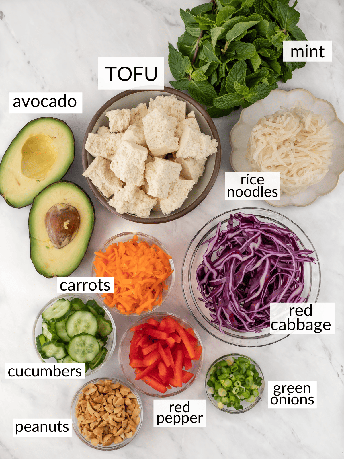 Ingredients for spicy tofu noodle bowl in individual bowls.