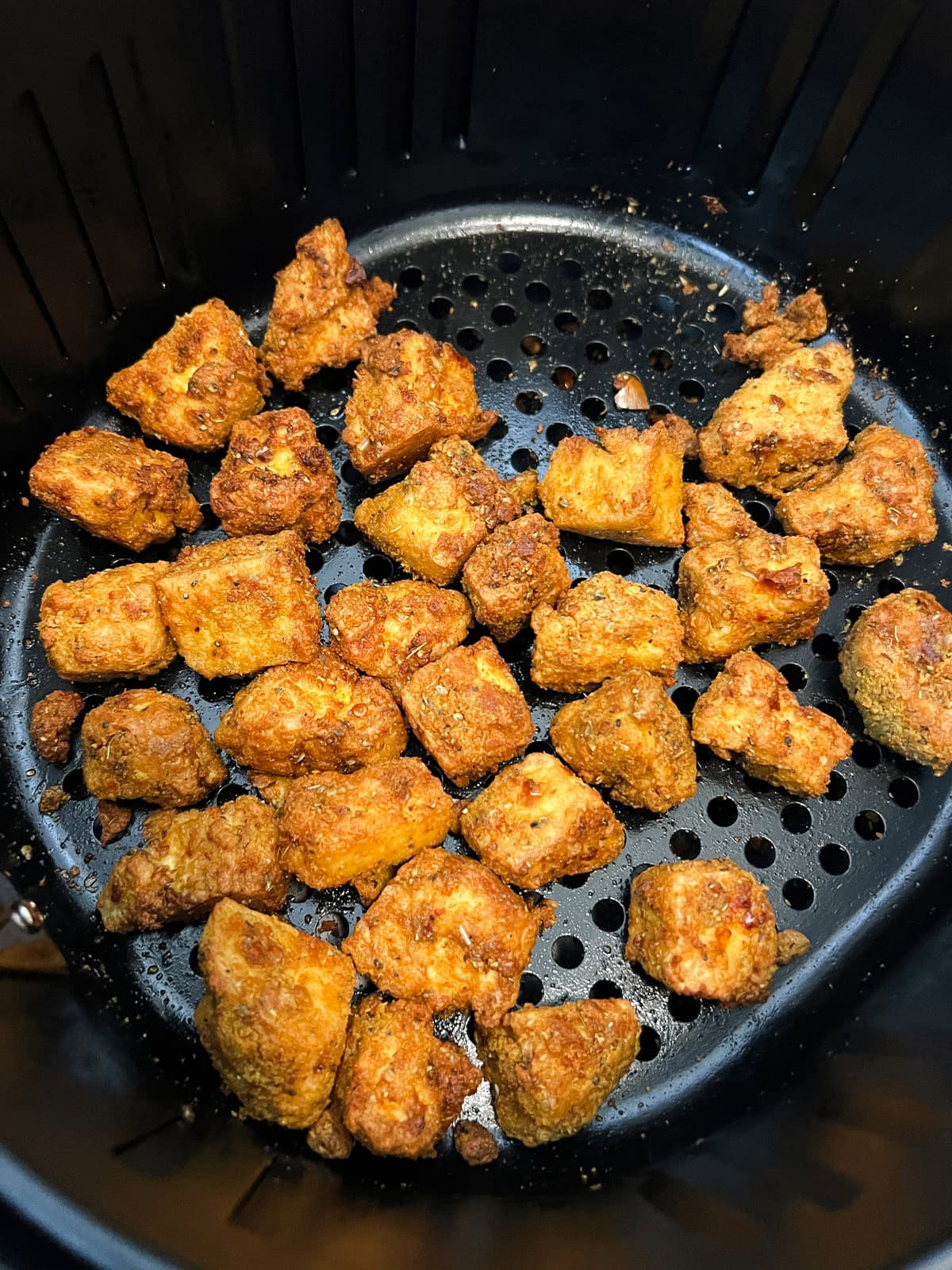 Crispy Italian seasoned tofu cubes in the air fryer.